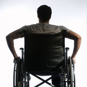 Back side of man in wheelchair