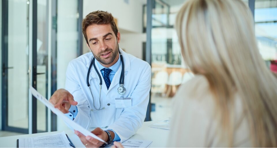 Doctor talking to patient